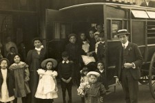 Children and teachers from Orwell Road Special School, Kirkdale get ready to set off for an enjoyable day trip wearing their best clothes, around 1910.