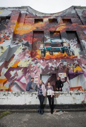 A giant piece of street art featuring Leon Rossiter, Lapsley, Katherine Rose Morley and Louis Berry and the cult game WipeOut is painted outside the Littlewoods building in Liverpool by Local artists Replete and Beta. Photo c. Fabio DePaola/PA Wire