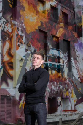A giant piece of street art featuring Louis Berry, and the cult game WipeOut is painted outside the Littlewoods building in Liverpool by Local artists Replete and Beta. Photo c. Fabio DePaola/PA Wire